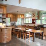 Quartersawn red oak kitchen with custom metalwork, stainless, granite and wood counters.