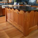 Arts and Crafts style kitchen to match clients decor.  Cherry cabinets with honed granite counters. Inset doors and drawers.
