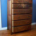 Hand cut dovetails, hard maple drawer sides.