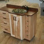 Hickory and walnut vanity with wood top and custom made handles.