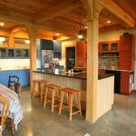 Maple cabinets, shaker doors. Glazed blue and red cabinets, inset seink drain cabinet, maple island.   Stainless, granite and maple counters.Design by Diana Katzman Balance Studio.